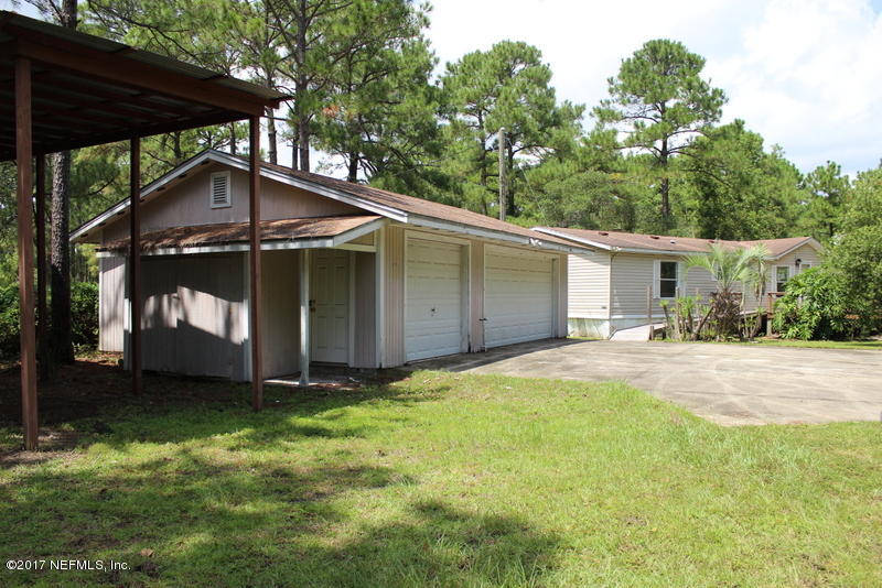 15577 Flounder Road Jacksonville, FL 32226 - Photo 28 of 35 a view of a house with backyard and garden