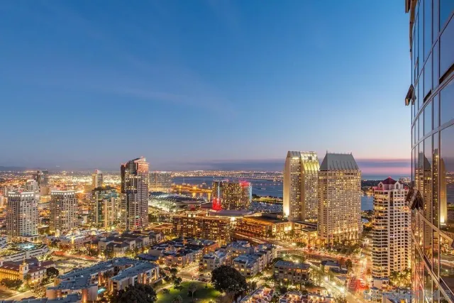 a view of a city with tall buildings