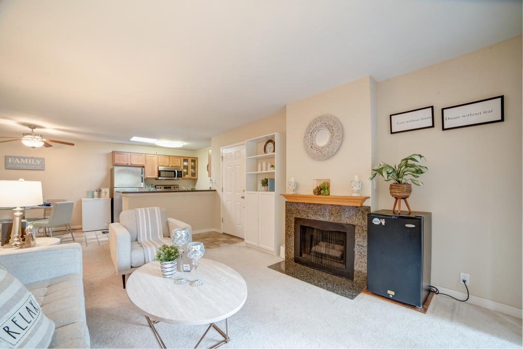 452 Dempsey Road, Unit 253 Milpitas, CA 95035 - Photo 14 of 26 a living room with furniture and a fireplace