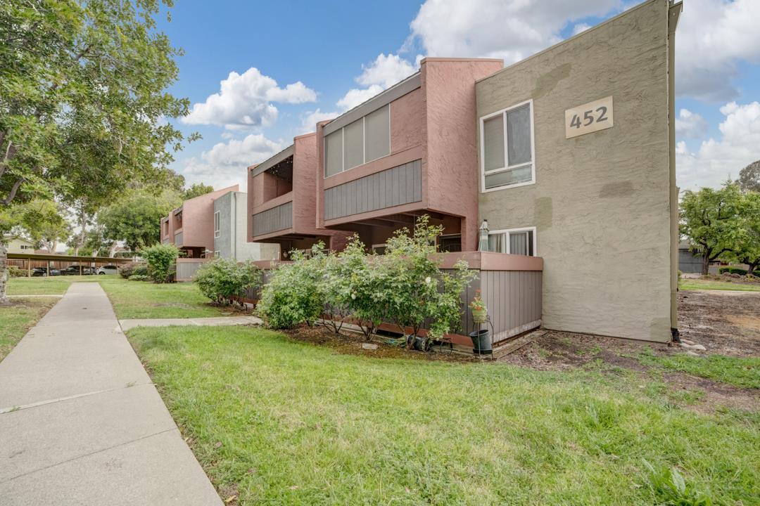 452 Dempsey Road, Unit 253 Milpitas, CA 95035 - Photo 3 of 26 a front view of a house with garden