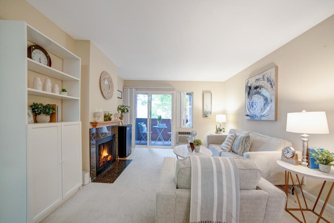 452 Dempsey Road, Unit 253 Milpitas, CA 95035 - Photo 4 of 26 a living room with furniture and a fireplace
