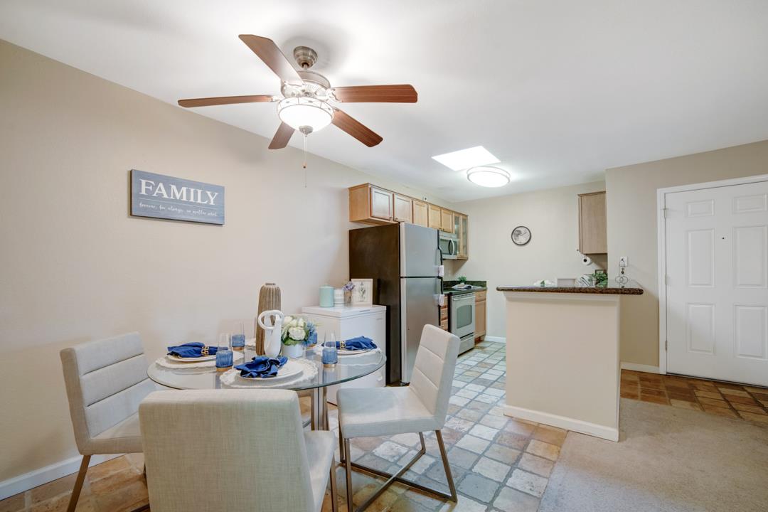 452 Dempsey Road, Unit 253 Milpitas, CA 95035 - Photo 6 of 26 a living room with furniture and a flat screen tv