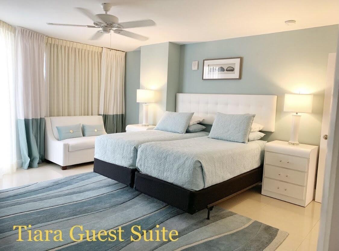 3000 North Ocean Drive, Unit 18G Singer Island, FL 33404 - Photo 42 of 46 a bedroom with bed and a couch