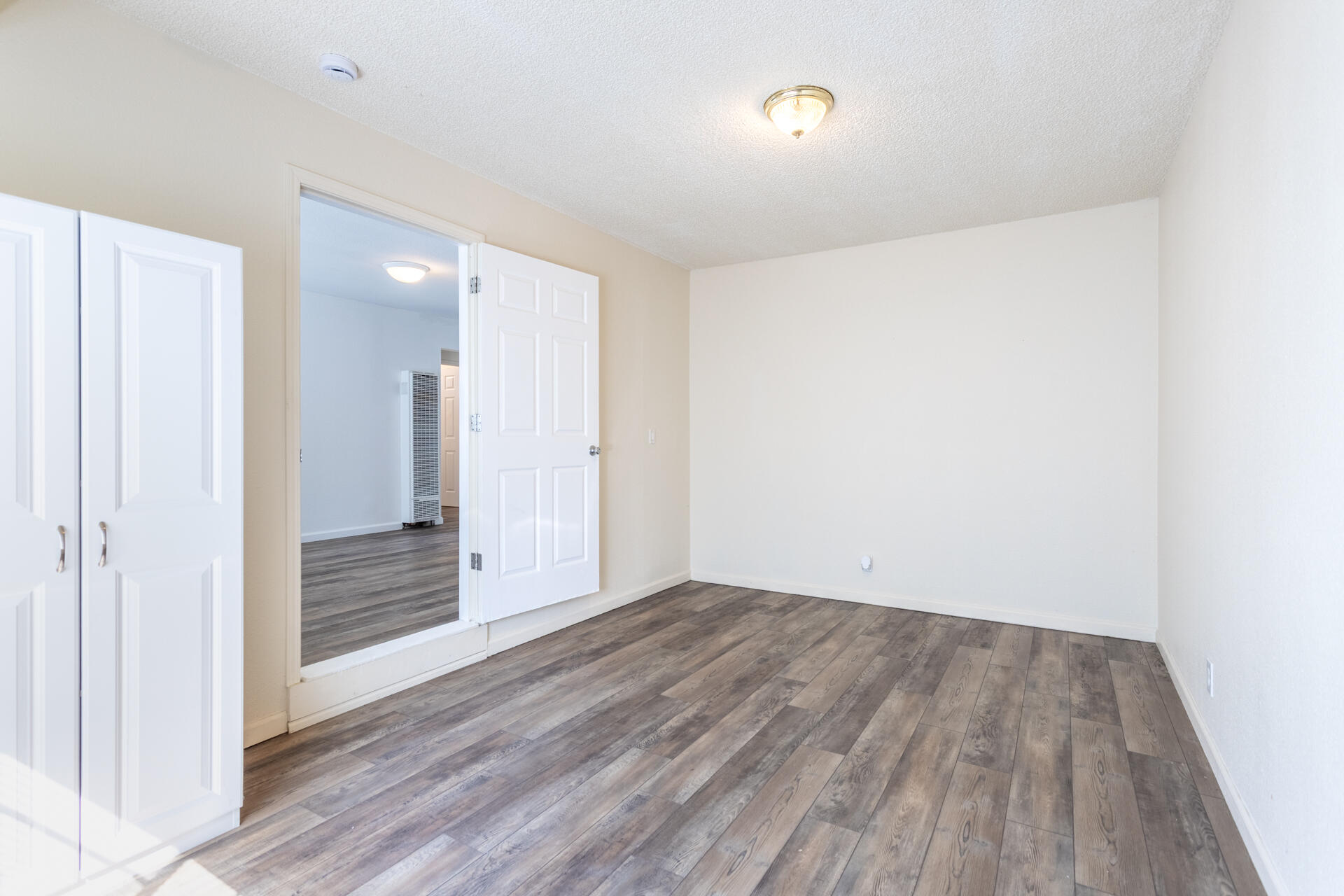 3252 Daisy Street Anderson, CA 96007 - Photo 10 of 20 a view of an empty room and wooden floor
