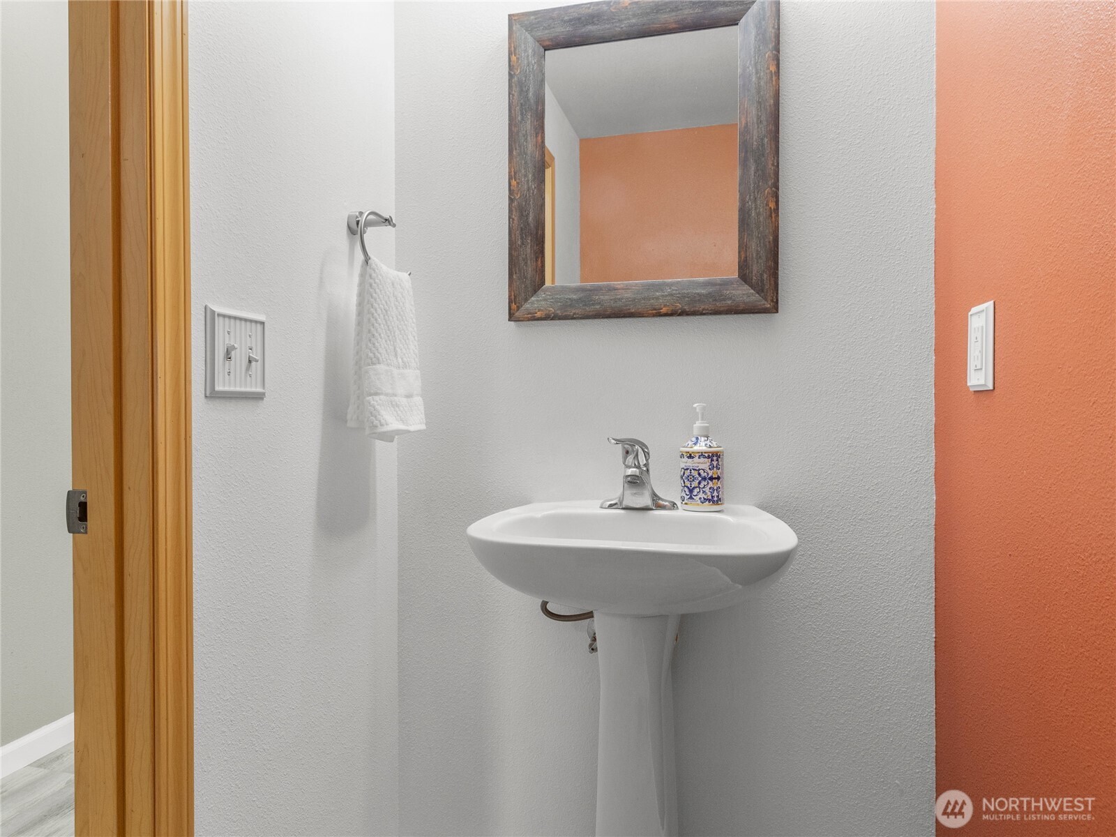 1331 Rowan Court DuPont, WA 98327 - Photo 13 of 31 a bathroom with a sink and a mirror