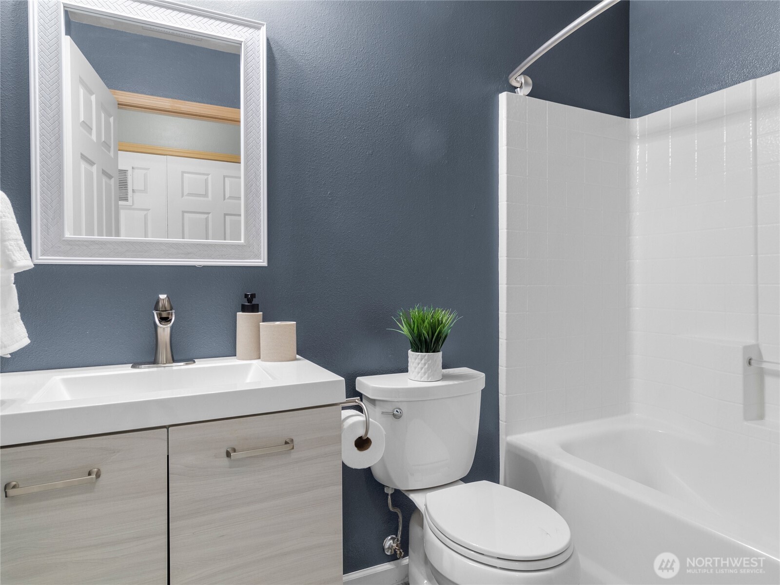 1331 Rowan Court DuPont, WA 98327 - Photo 20 of 31 a bathroom with a sink a toilet and tub