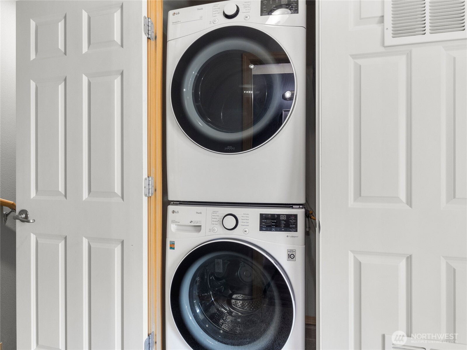 1331 Rowan Court DuPont, WA 98327 - Photo 21 of 31 a view of a hallway with washer and dryer