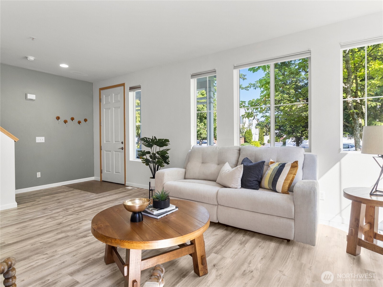 1331 Rowan Court DuPont, WA 98327 - Photo 8 of 31 a living room with furniture and a potted plant