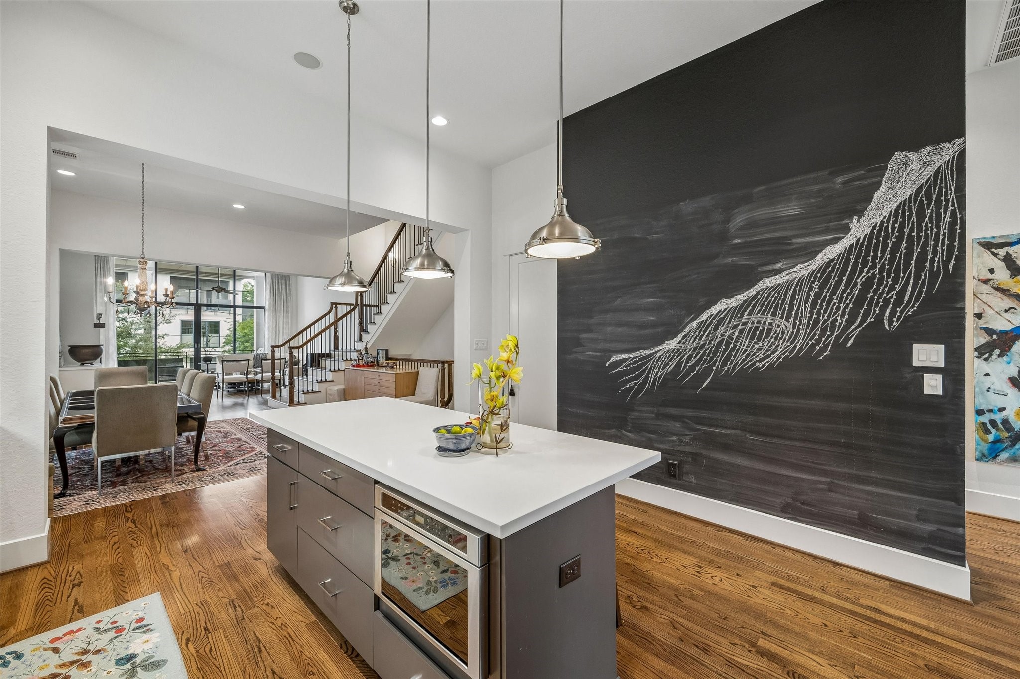 1526 Vermont Street Houston, TX 77006 - Photo 21 of 39 Large center island anchors the kitchen and opens seamlessly to the dining and living areas for easy everyday living and entertaining.