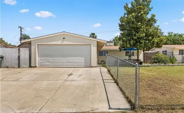 a front view of a house with a garage