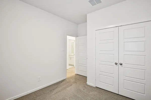 an empty room with closet