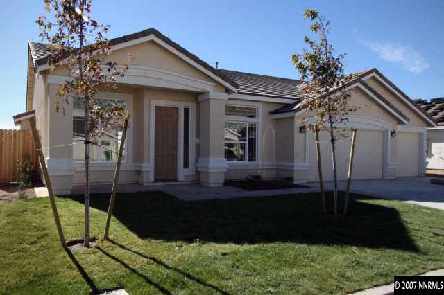 1452 Hagar Road Reno, NV 89506 - Photo 1 of 1 a front view of a house with garden