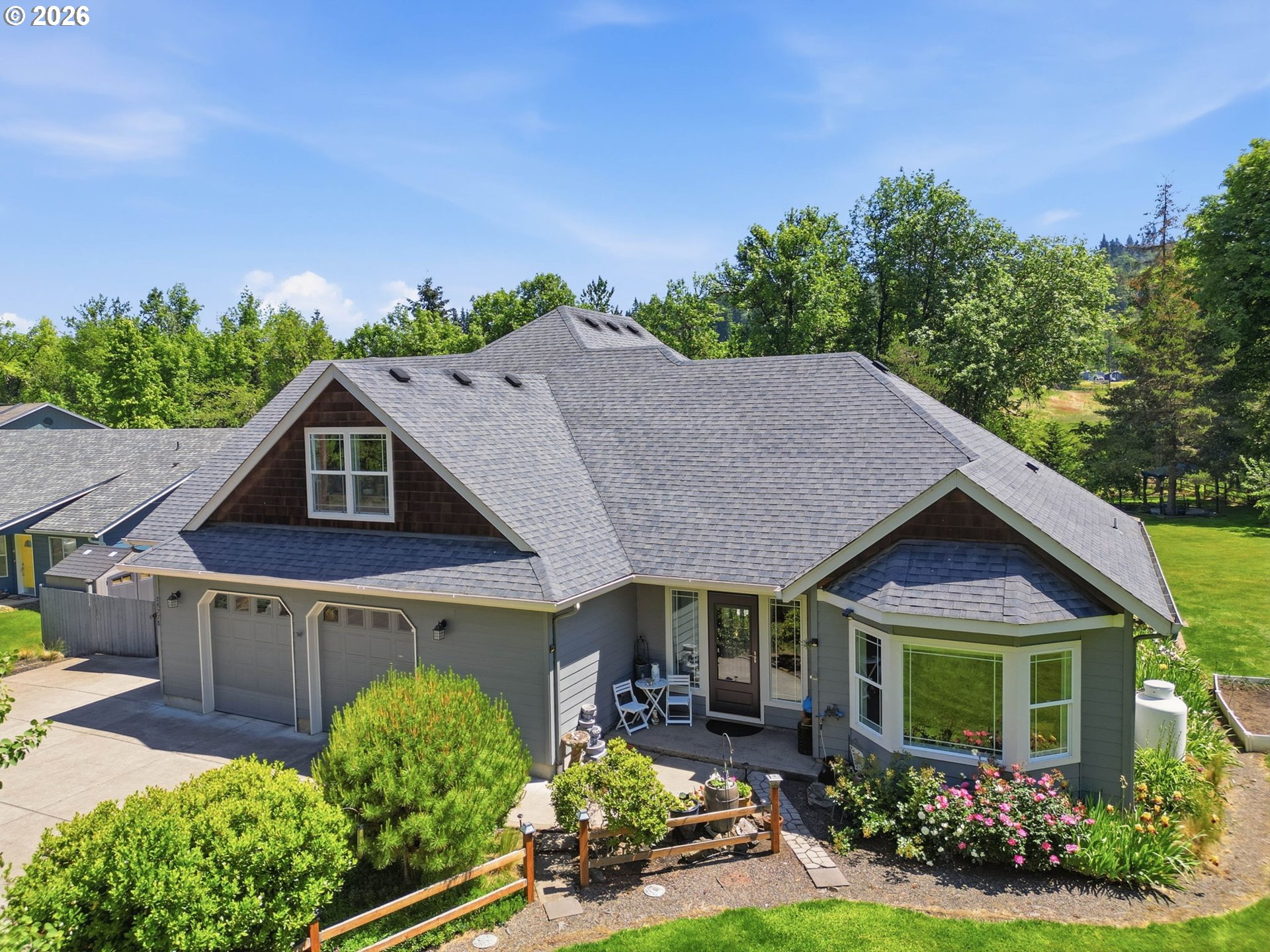 29778 Gimpl Hill Road Eugene, OR 97405 - Photo 43 of 43 a house view with a garden space