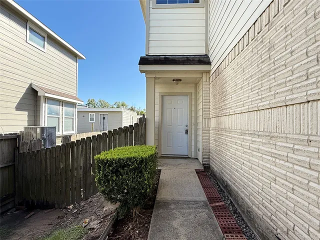 a view of a pathway with a house