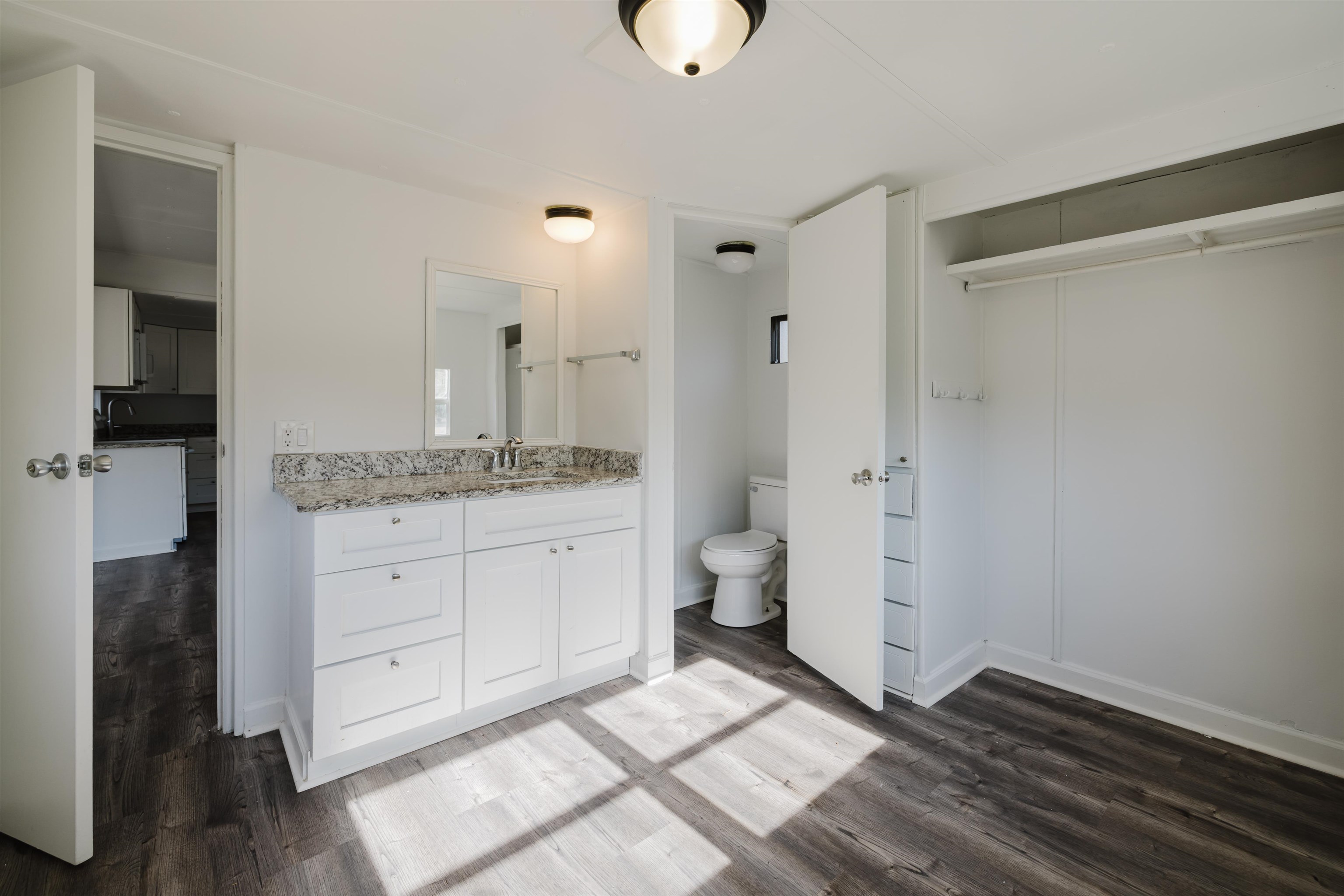 1805 Cactus Drive Loris, SC 29569 - Photo 22 of 31 Bathroom with vanity and dark wood-style floors