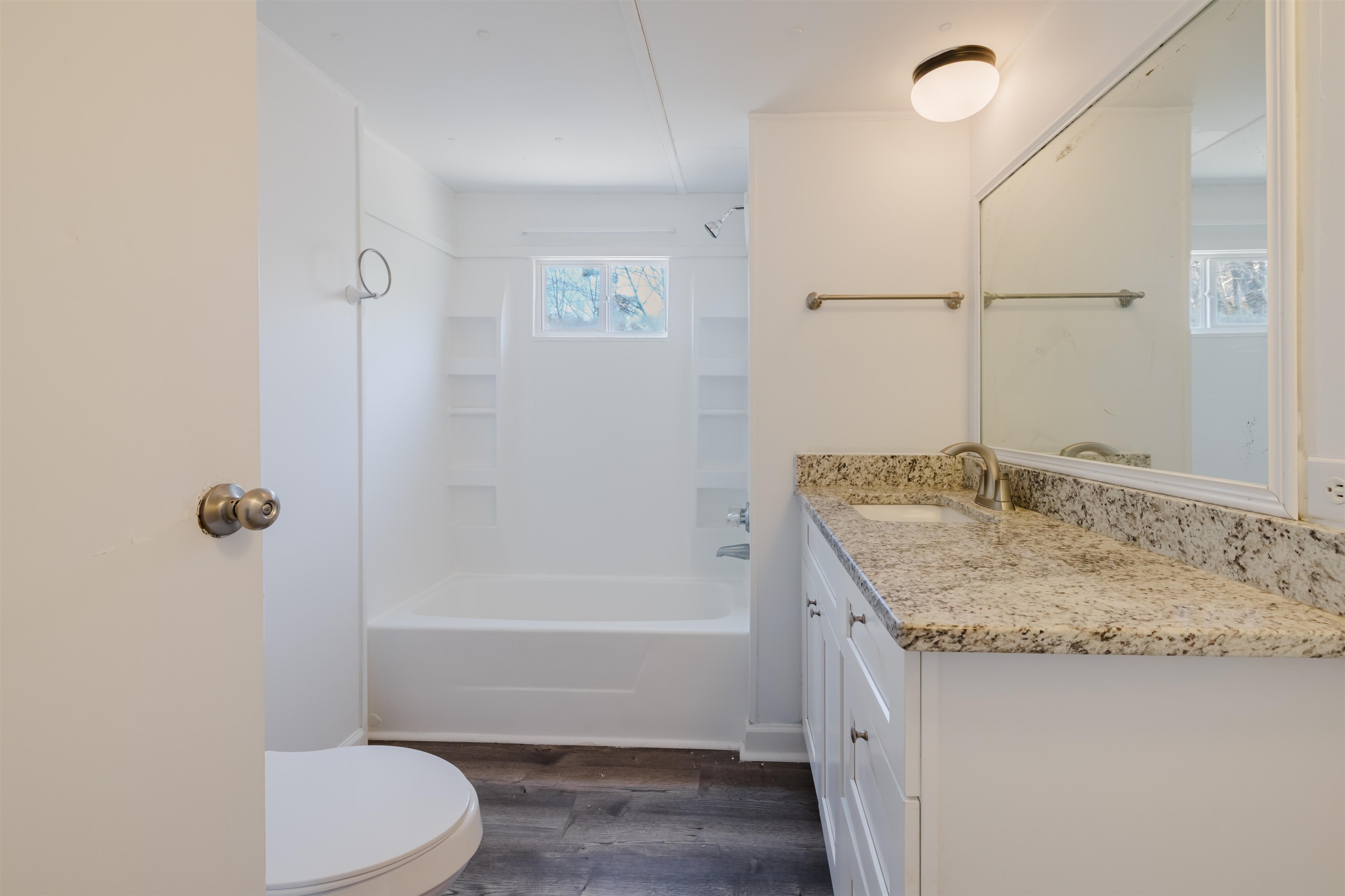 1805 Cactus Drive Loris, SC 29569 - Photo 10 of 31 Bathroom with dark wood-style floors, bathing tub / shower combination, and vanity