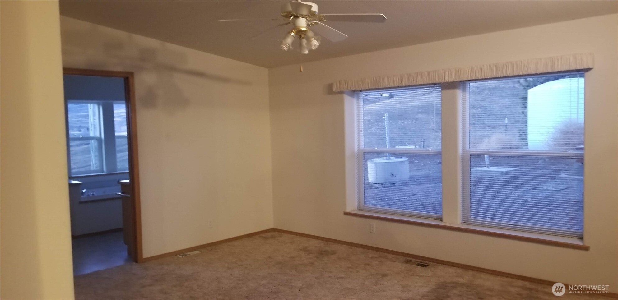 1579 Pine Creek Road, Unit A Tonasket, WA 98855 - Photo 20 of 24 an empty room with closet