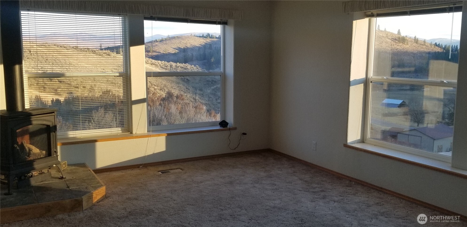 1579 Pine Creek Road, Unit A Tonasket, WA 98855 - Photo 23 of 24 a view of an empty room with a window