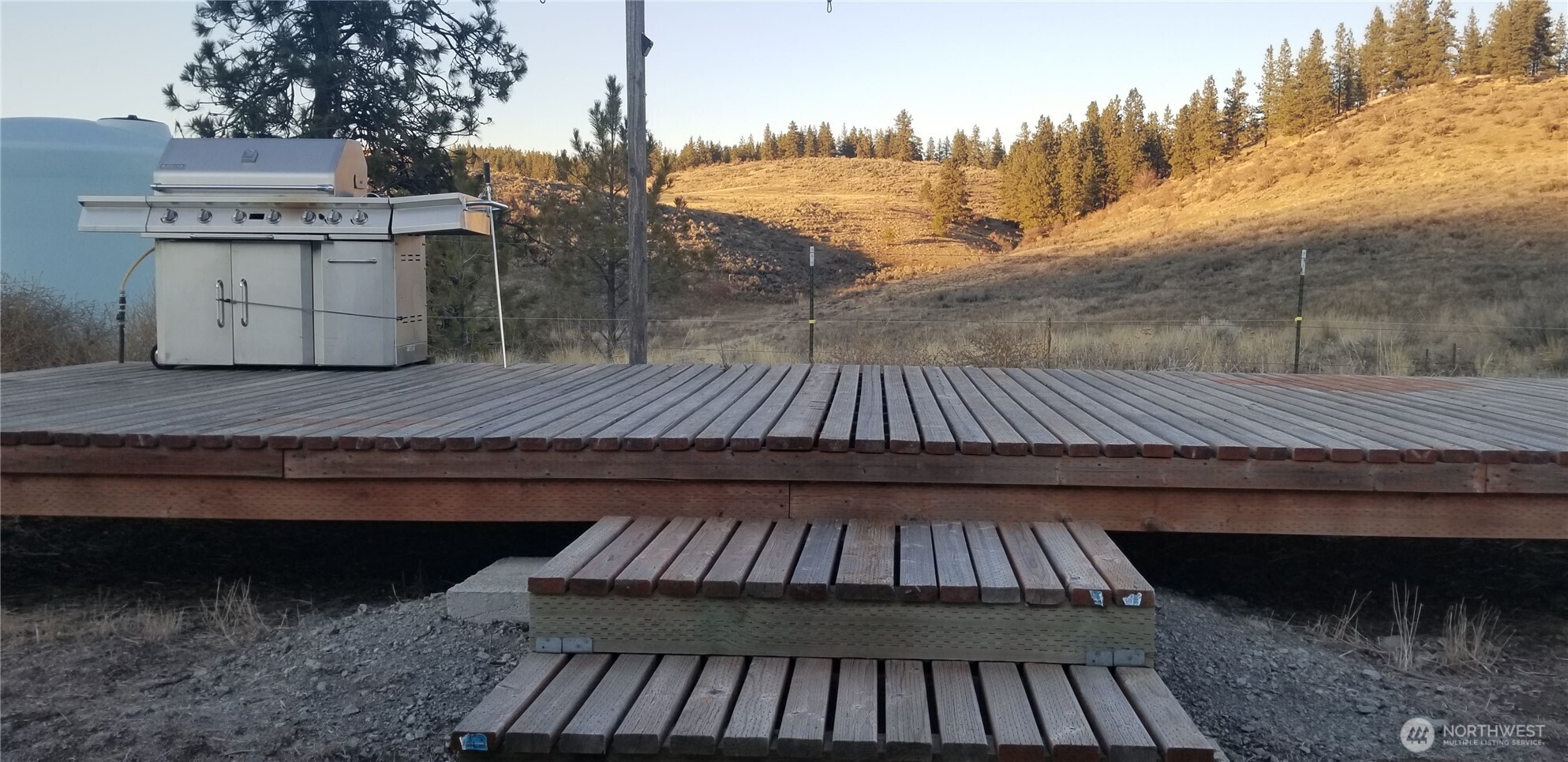 1579 Pine Creek Road, Unit A Tonasket, WA 98855 - Photo 4 of 24 a view of outdoor space and deck