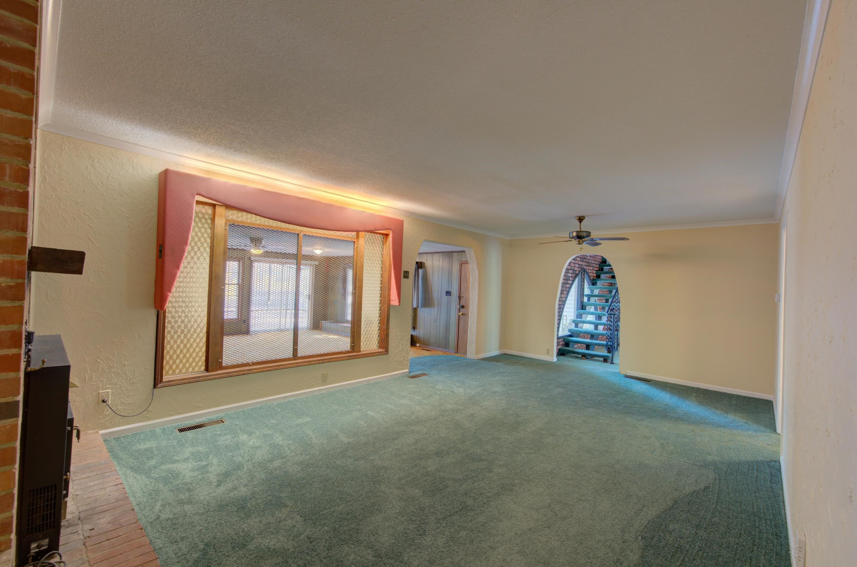 5786 Spring Lake Road Memphis, TN 38135 - Photo 3 of 25 a view of empty room with a fireplace