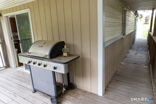 a view of washer and dryer with wooden floor