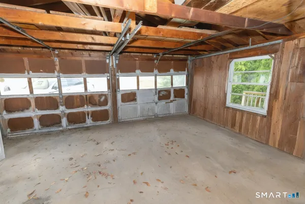 a view of an empty room with windows