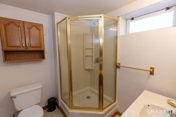 a bathroom with a sink vanity and mirror