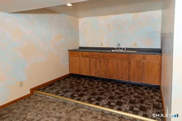 a bathroom with a shower and a toilet