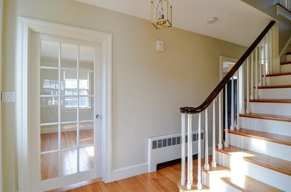 77 West Central Street Natick, MA 01760 - Photo 16 of 22 a view of entryway and hall with wooden floor