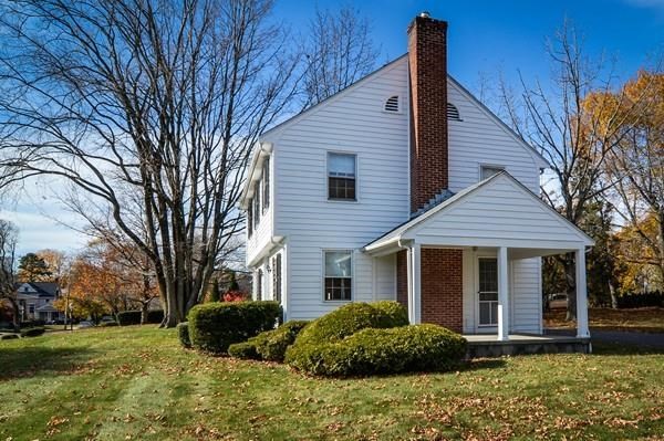 77 West Central Street Natick, MA 01760 - Photo 2 of 22 front view of a house with a yard