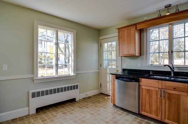 77 West Central Street Natick, MA 01760 - Photo 7 of 22 a kitchen that has a sink and a window