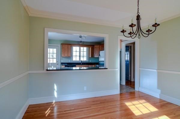 77 West Central Street Natick, MA 01760 - Photo 9 of 22 a view of a room with wooden floor and a window