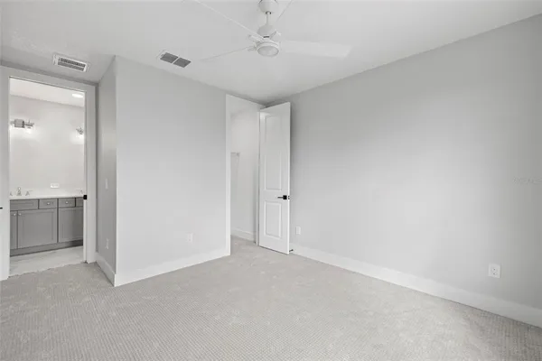 an empty room with a bathroom