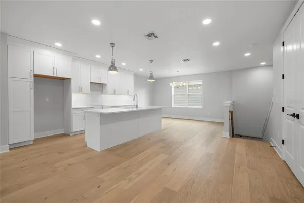 a view of kitchen and windows