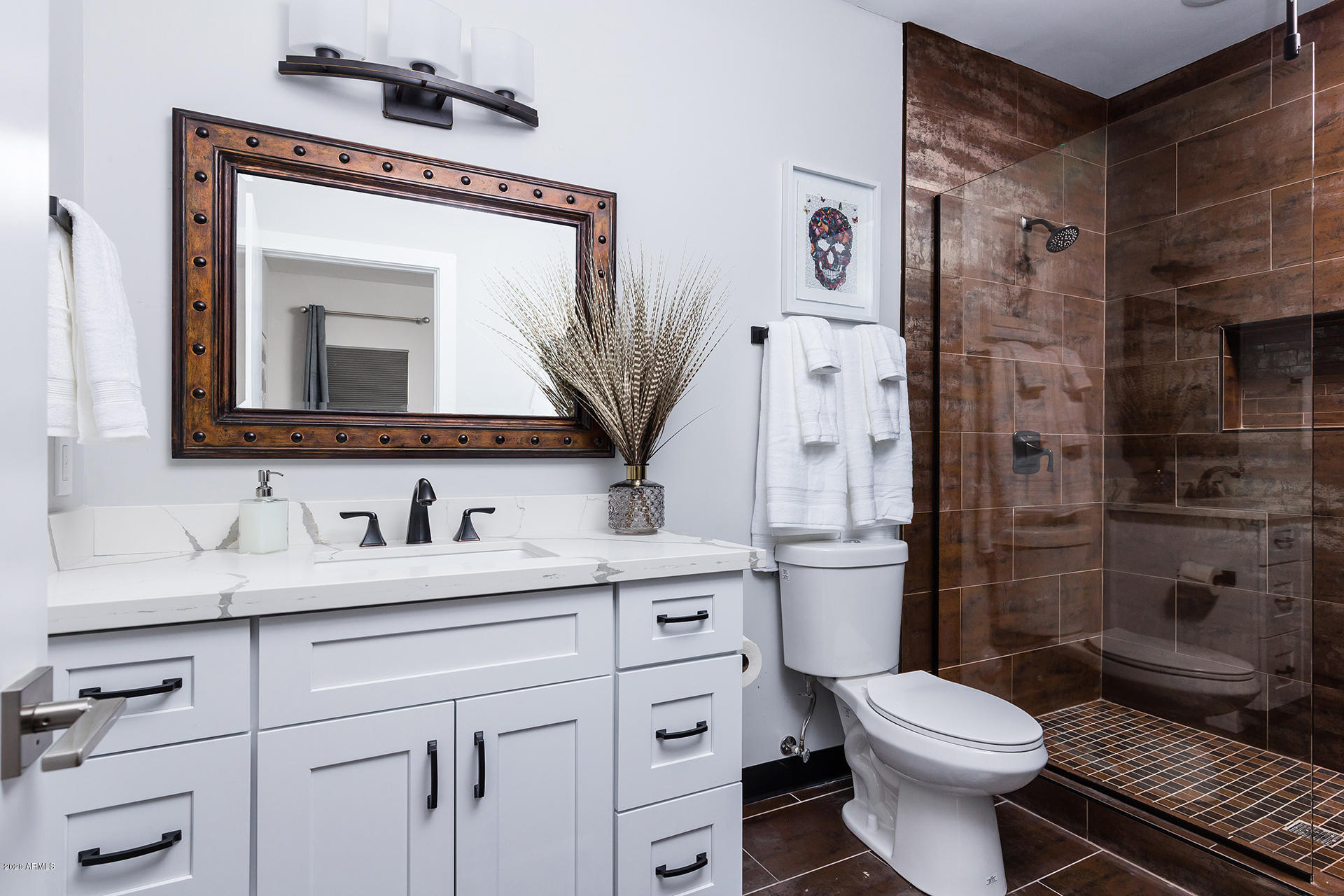 7505 East Main Street, Unit A Scottsdale, AZ 85251 - Photo 16 of 30 a bathroom with a toilet sink vanity granite and shower
