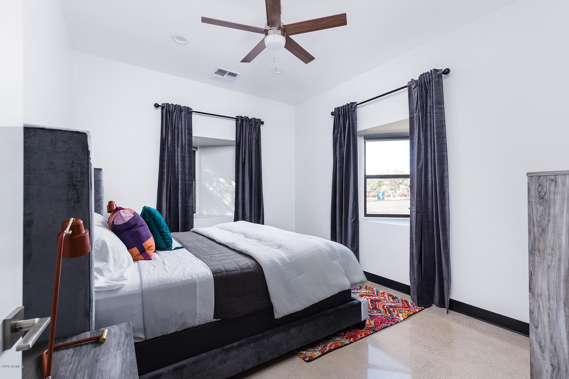 7505 East Main Street, Unit A Scottsdale, AZ 85251 - Photo 21 of 30 a bedroom with bed and window