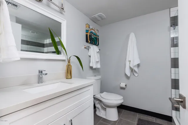 a bedroom with bed and window