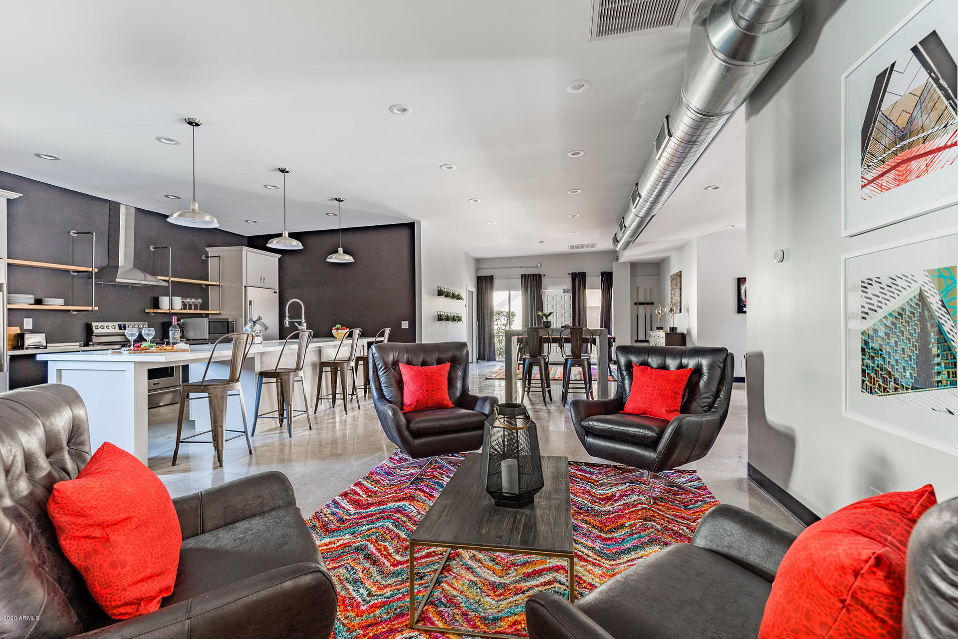 7505 East Main Street, Unit A Scottsdale, AZ 85251 - Photo 4 of 30 a living room with furniture kitchen and a wooden floor