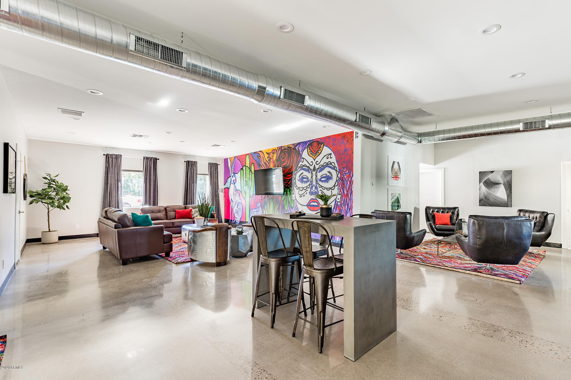 7505 East Main Street, Unit A Scottsdale, AZ 85251 - Photo 6 of 30 a living room with lots of furniture and couch