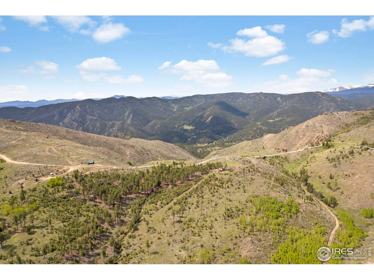 1009 County Road 87J Lyons, CO 80540 - Photo 13 of 29 a view of an lake and mountain