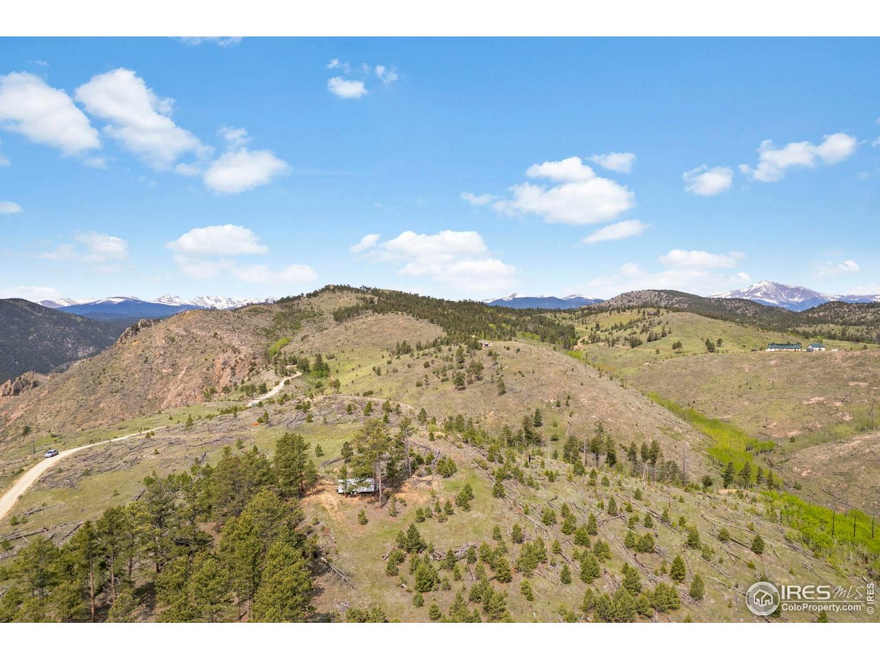 1009 County Road 87J Lyons, CO 80540 - Photo 14 of 29 a view of lake with mountain