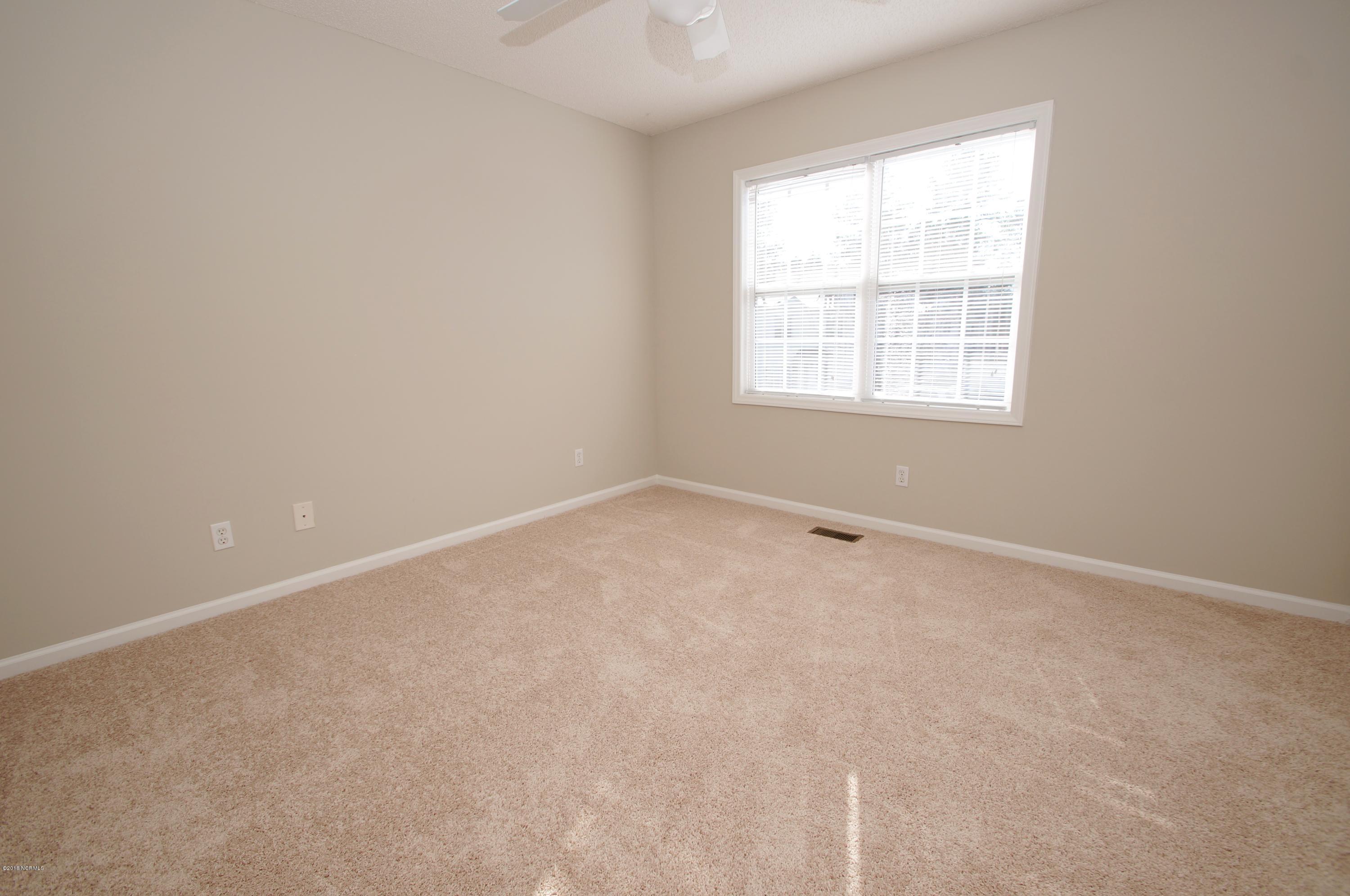 1015 Spring Forest Road, Unit F6 Greenville, NC 27834 - Photo 20 of 21 Large Spare Bedroom - All New Carpet Throughout