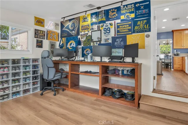 a room with furniture and gym equipment