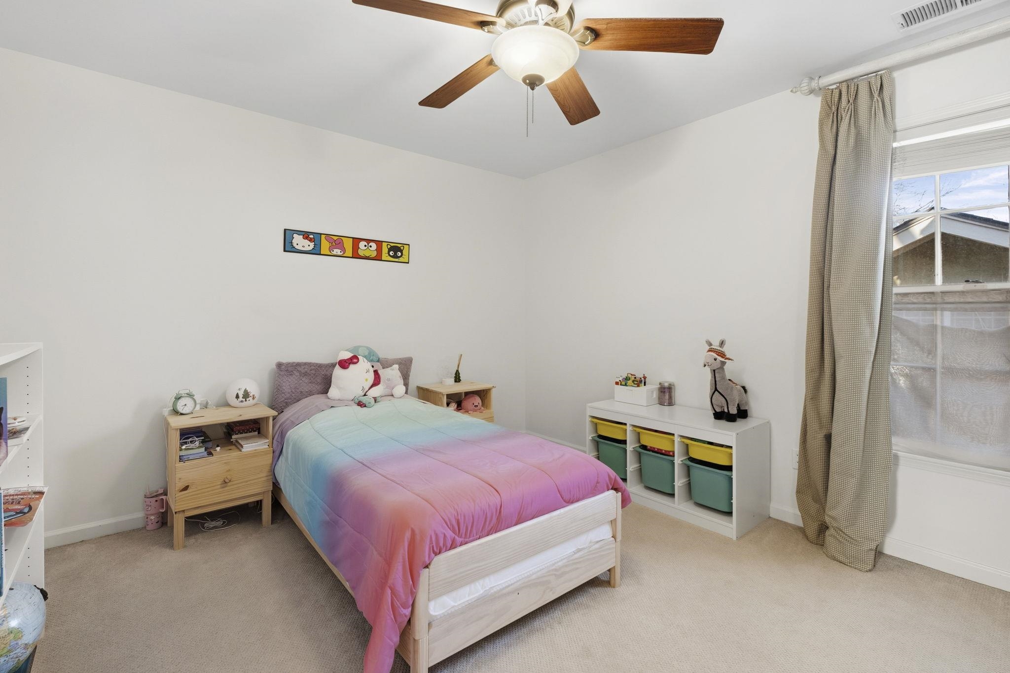 395 Alexander Street Memphis, TN 38111 - Photo 20 of 36 a bedroom with a bed and a chandelier