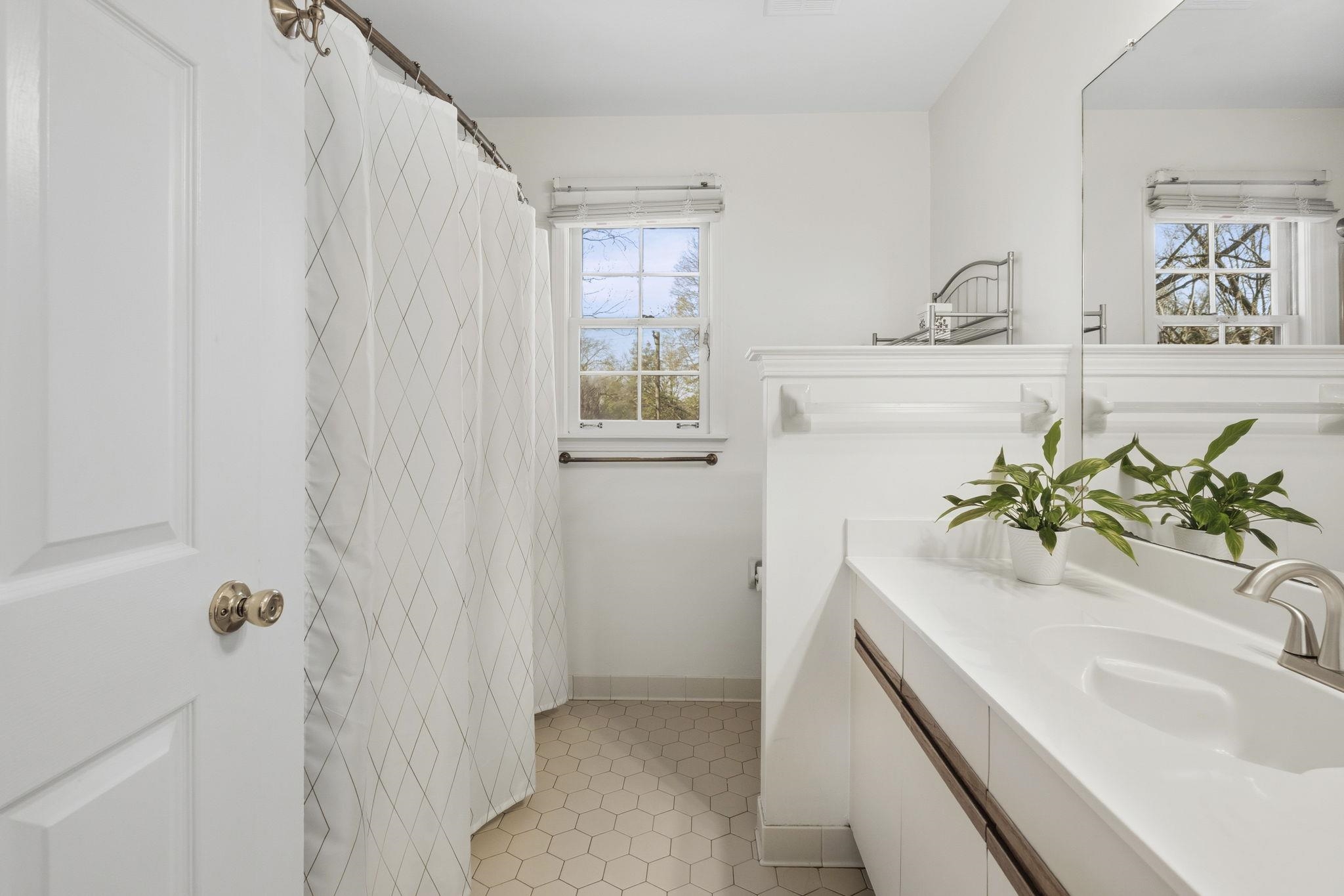395 Alexander Street Memphis, TN 38111 - Photo 21 of 36 a bathroom with a sink a granite tub and shower
