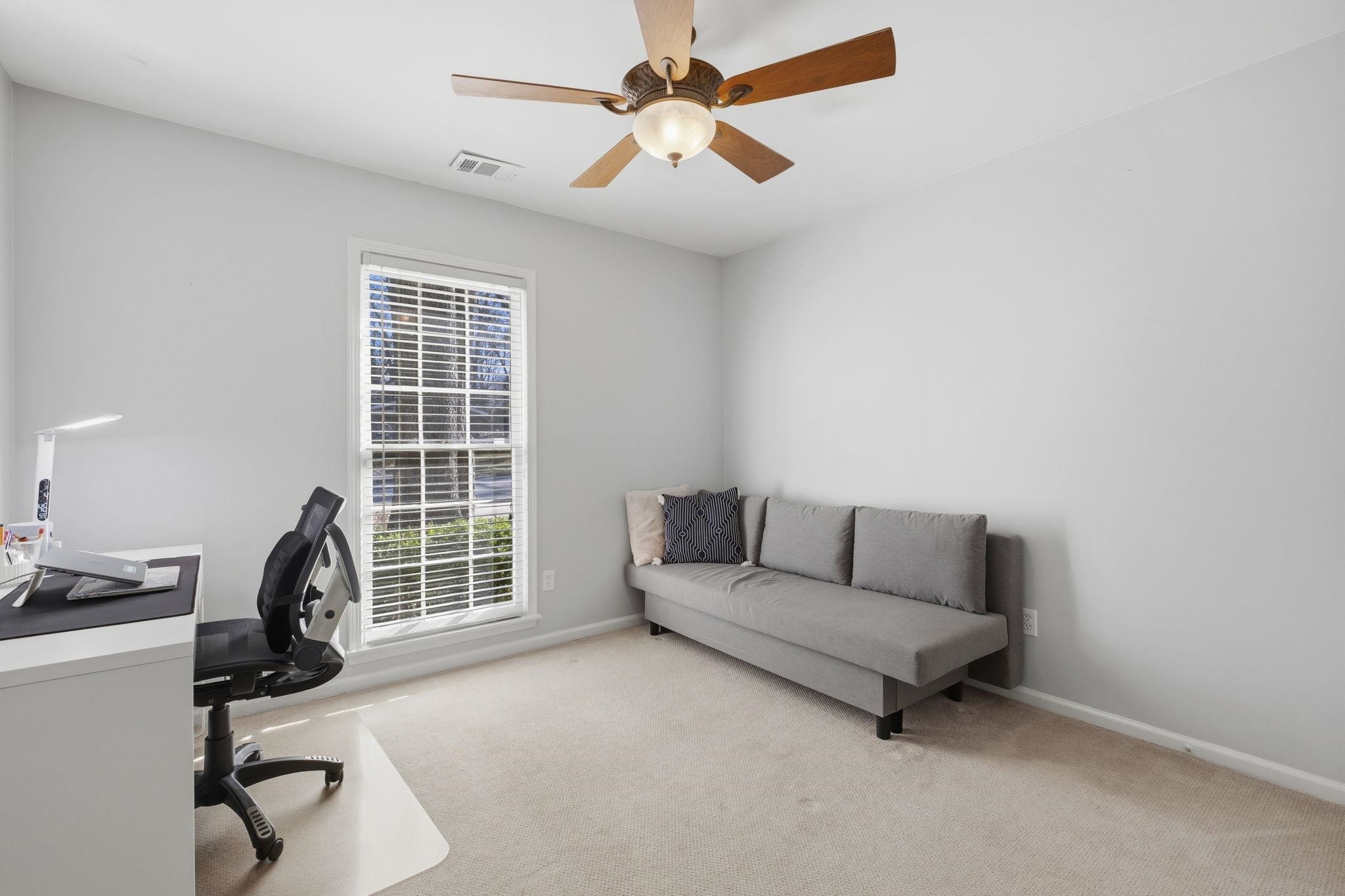 395 Alexander Street Memphis, TN 38111 - Photo 23 of 36 a living room with furniture and a window