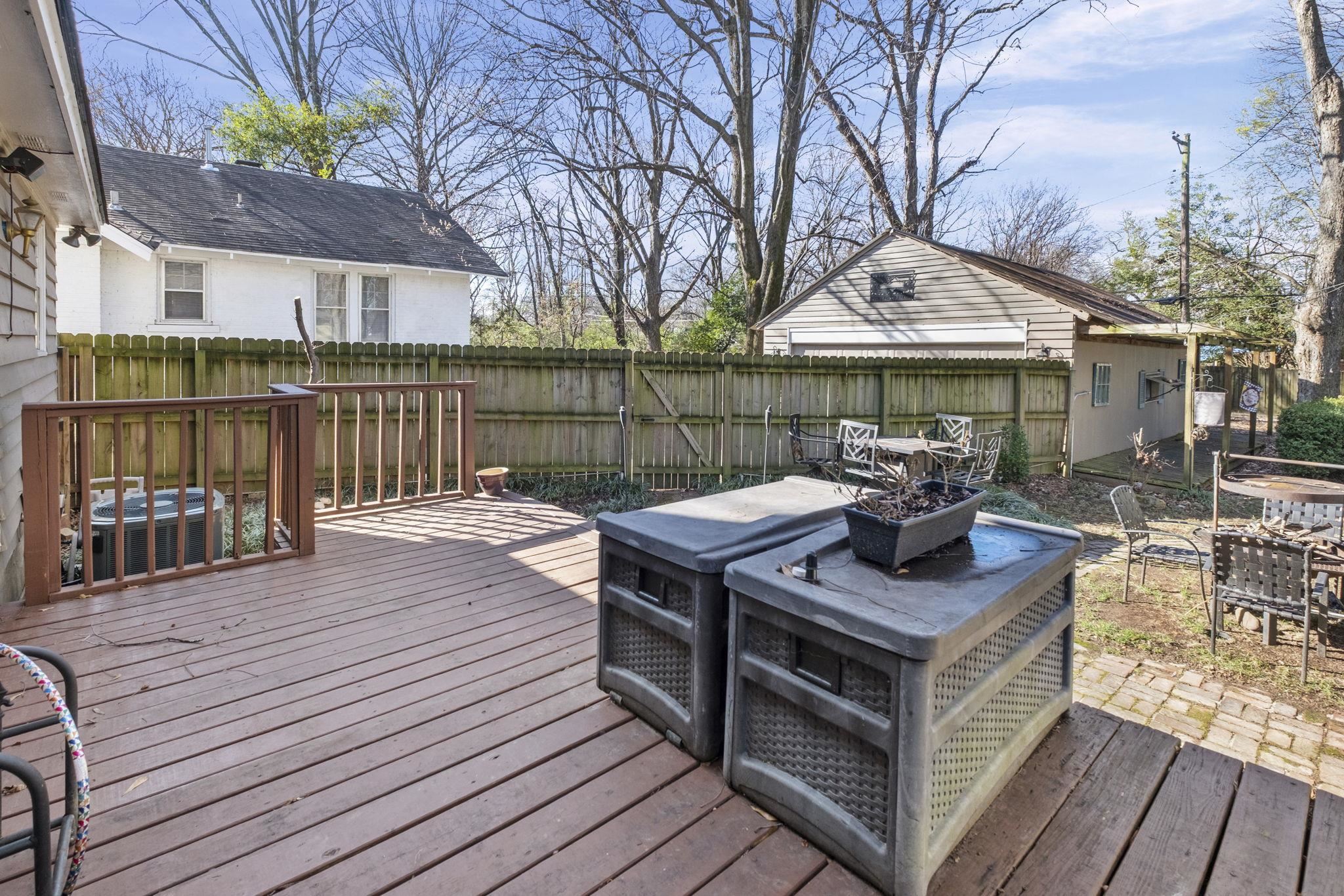 395 Alexander Street Memphis, TN 38111 - Photo 25 of 36 a view of house with deck outdoor seating and kitchen view