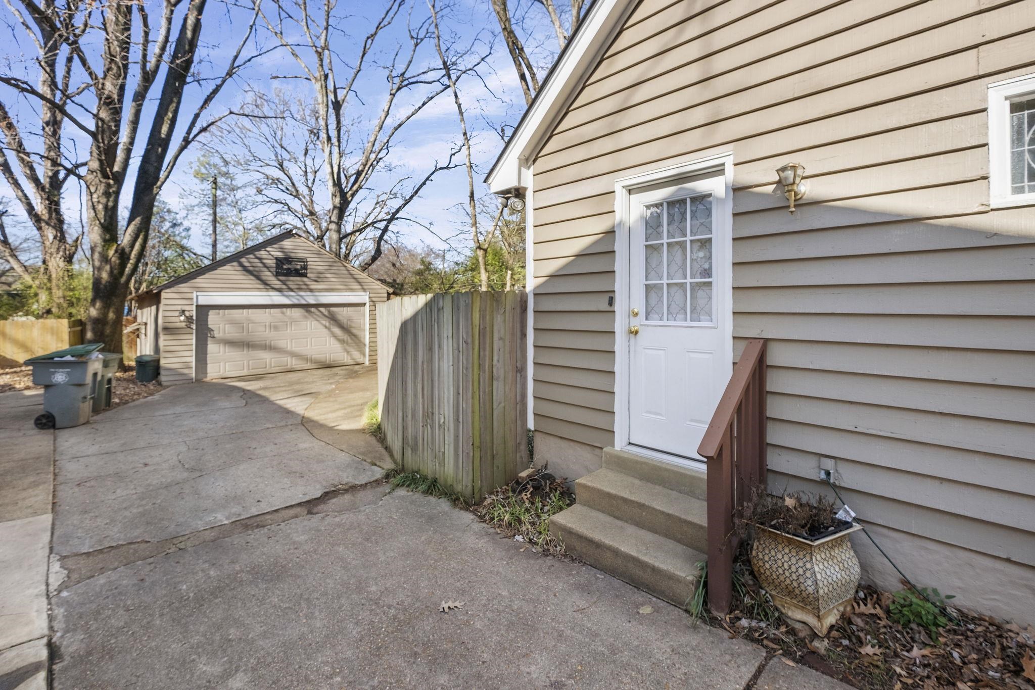 395 Alexander Street Memphis, TN 38111 - Photo 5 of 36 a view of a house with a garage