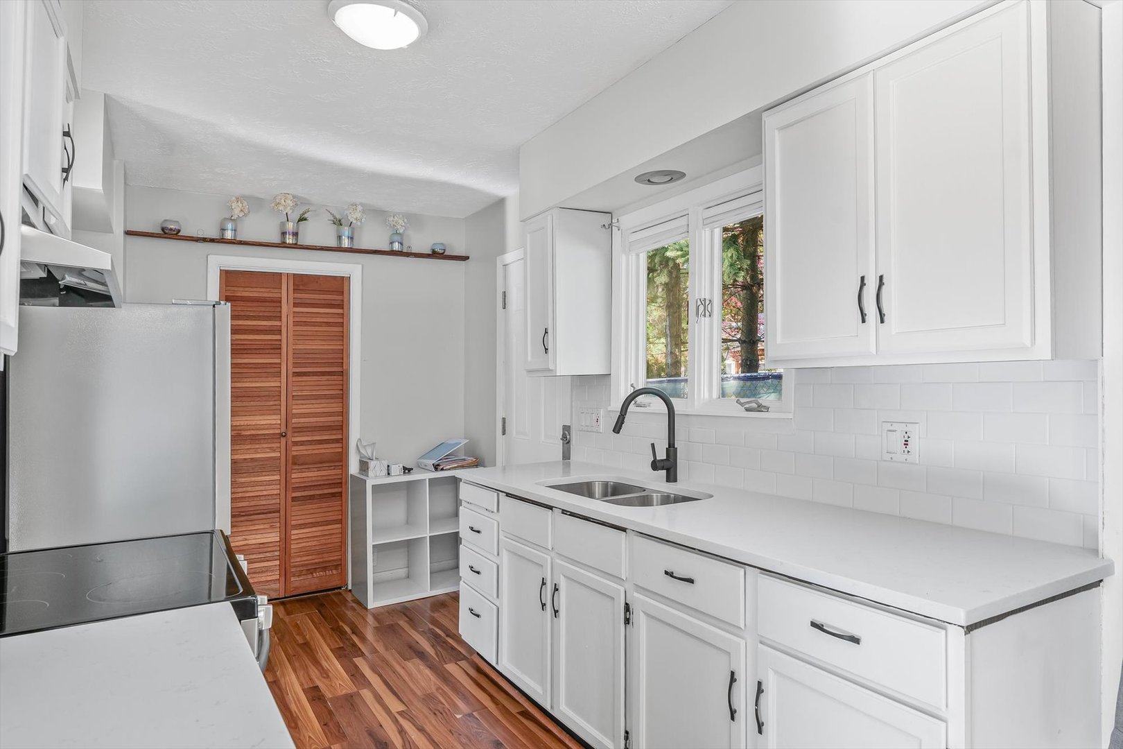 606 Cullom Street Normal, IL 61761 - Photo 11 of 27 a kitchen with a sink cabinets and window