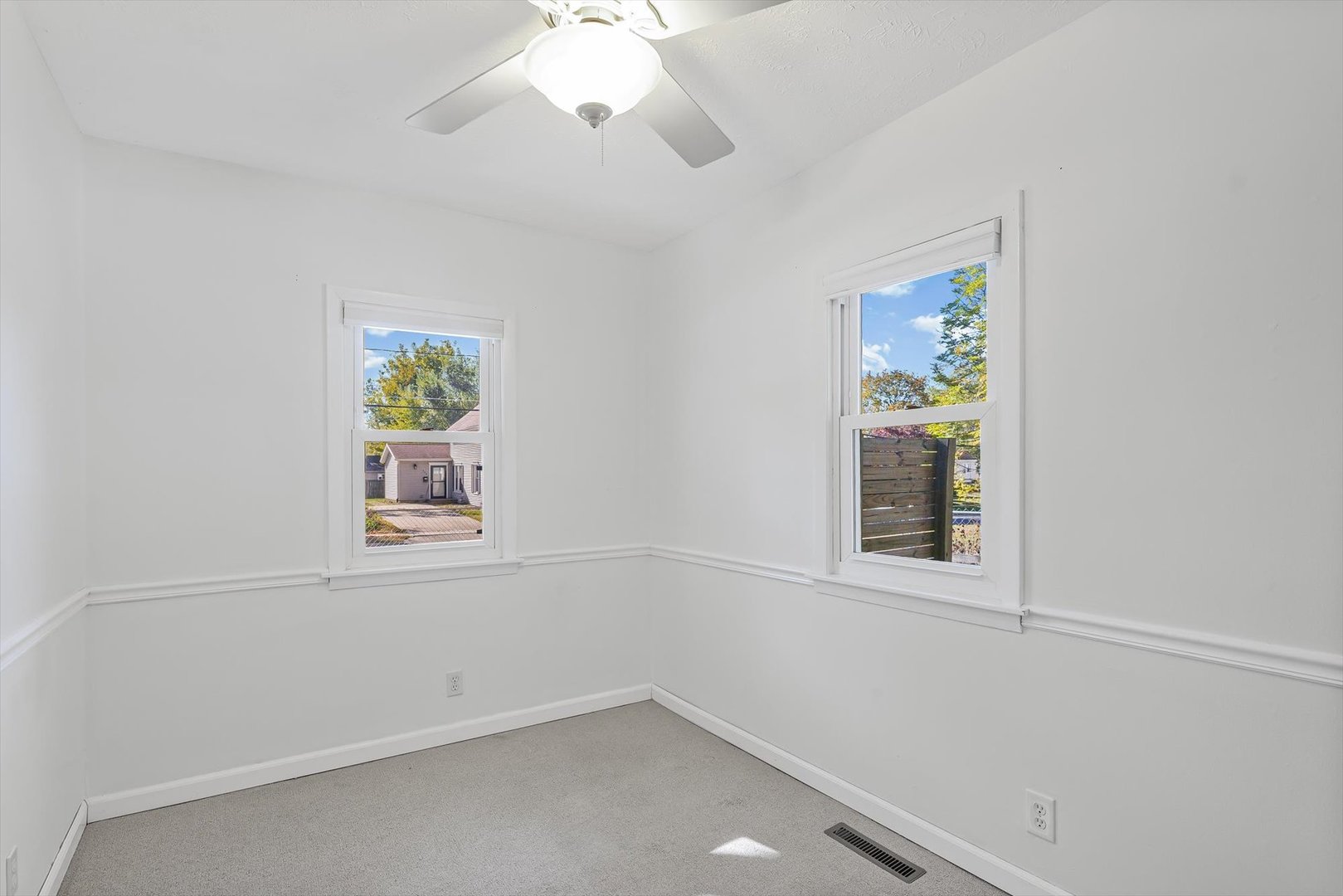 606 Cullom Street Normal, IL 61761 - Photo 18 of 27 an empty room with windows